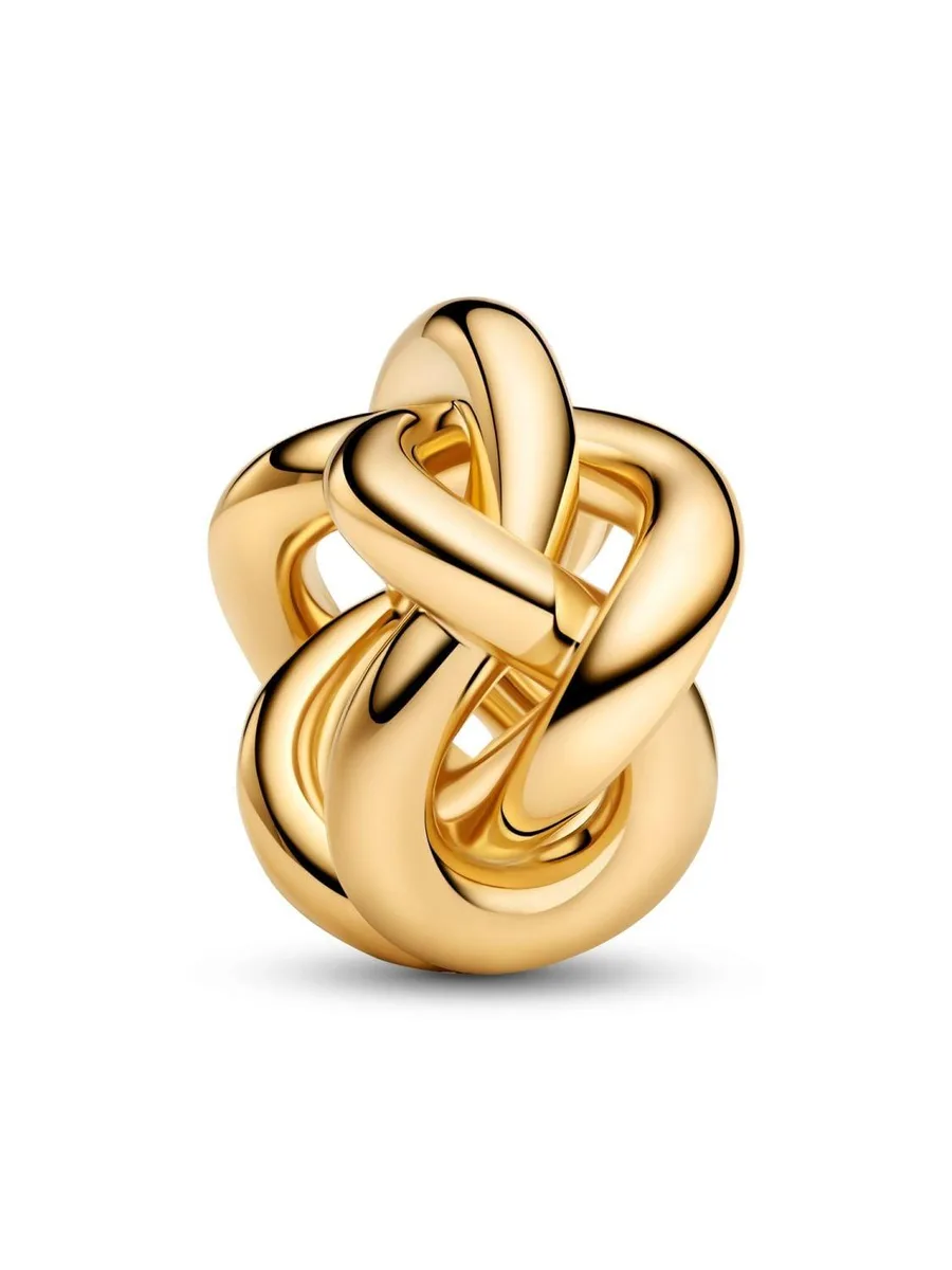 A small 14k gold-plated charm shaped as a three-dimensional infinity knot with twisted loops