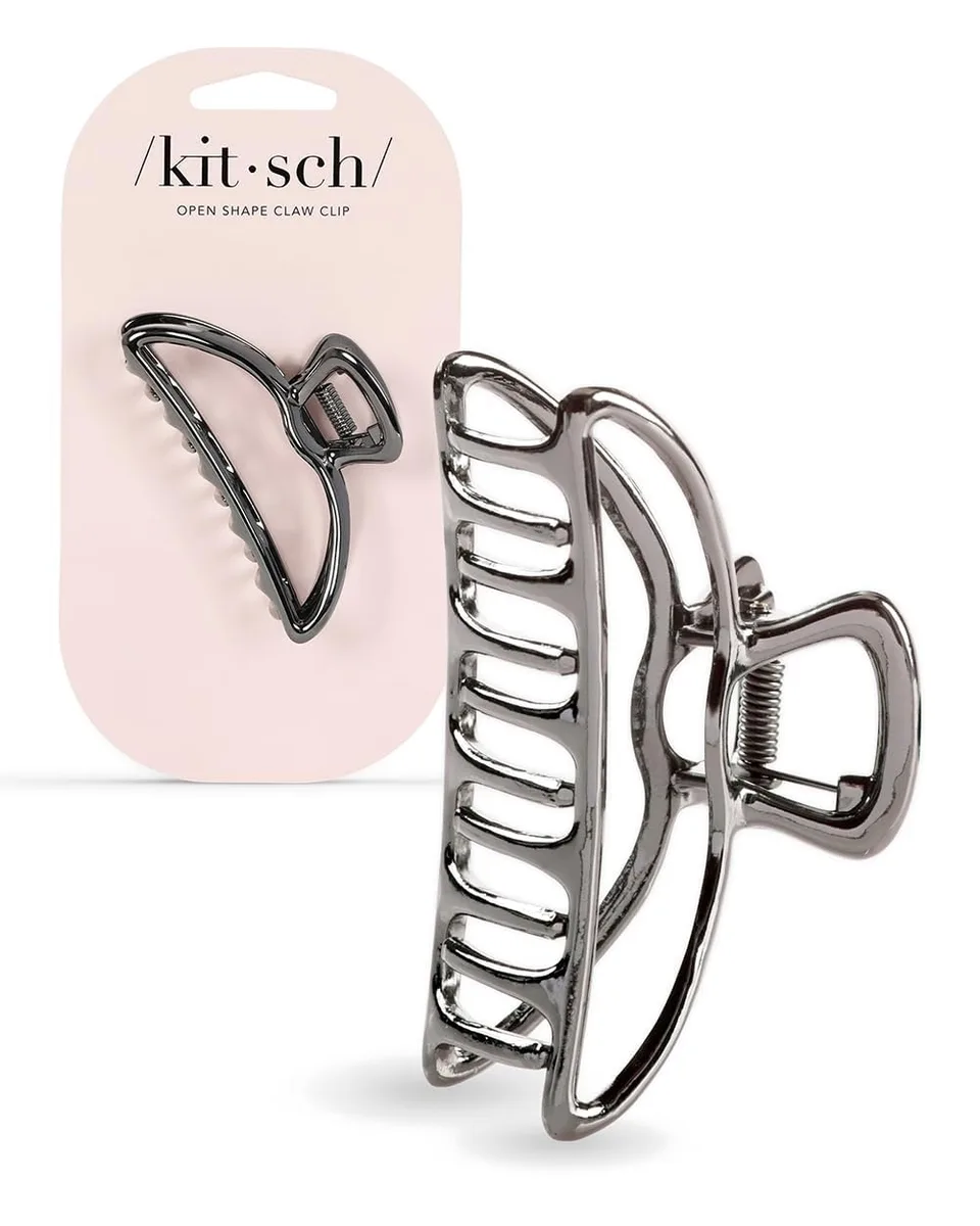 A single hematite metal claw clip with open arch shape