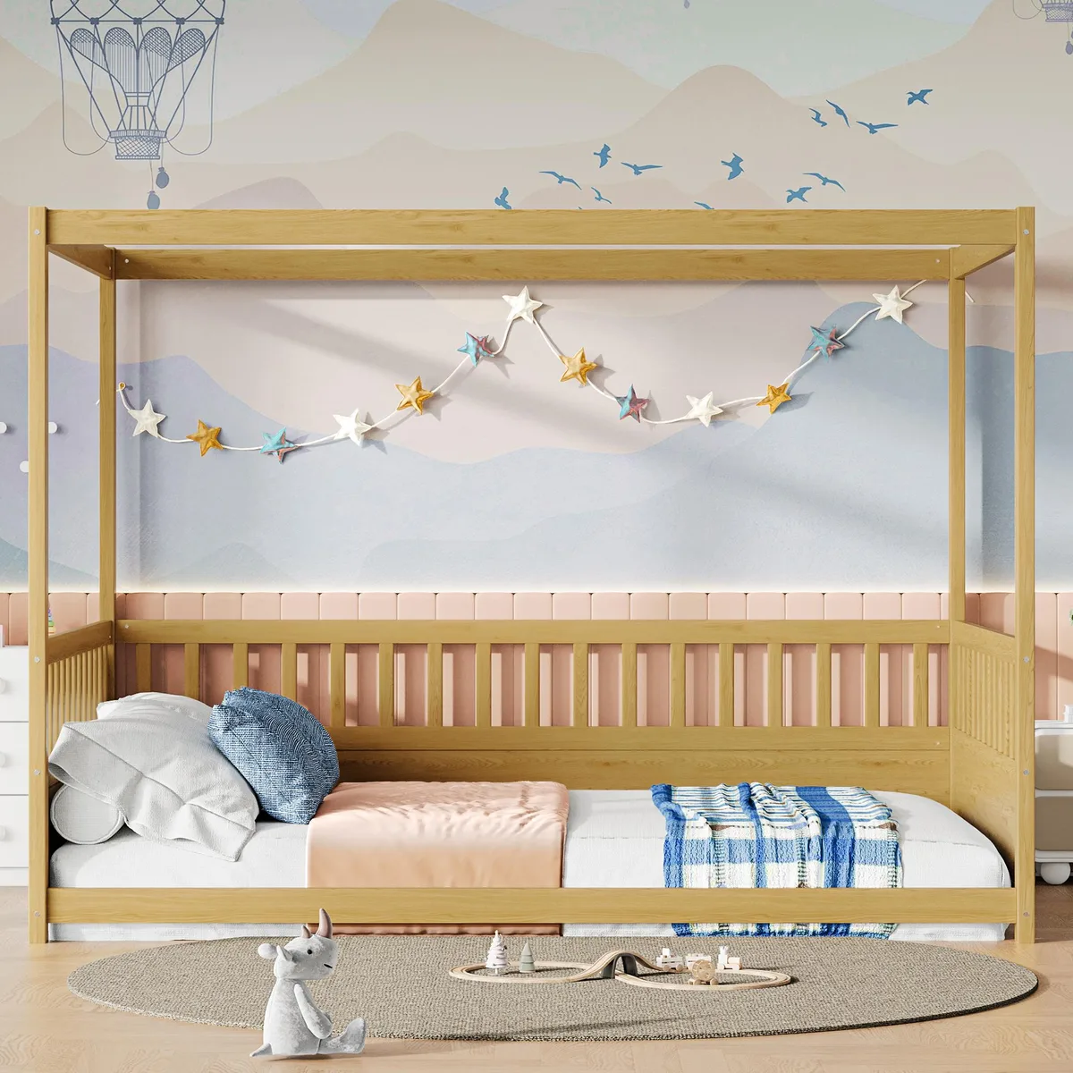 Full-size canopy bed frame in natural pine with tall guardrails