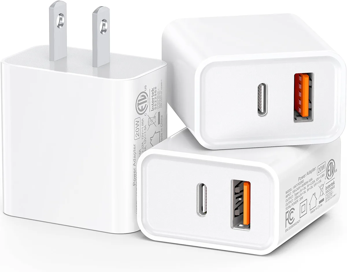 Three compact white dual-port USB-C wall chargers side by side