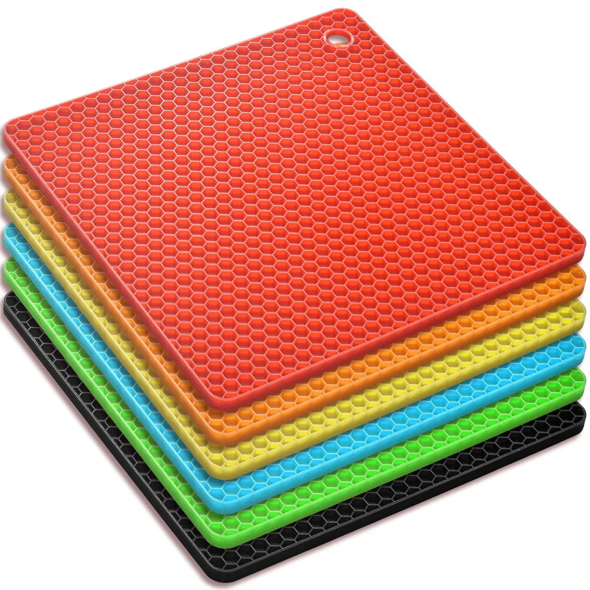 Six square silicone mats in assorted colours, each 18 cm with honeycomb texture