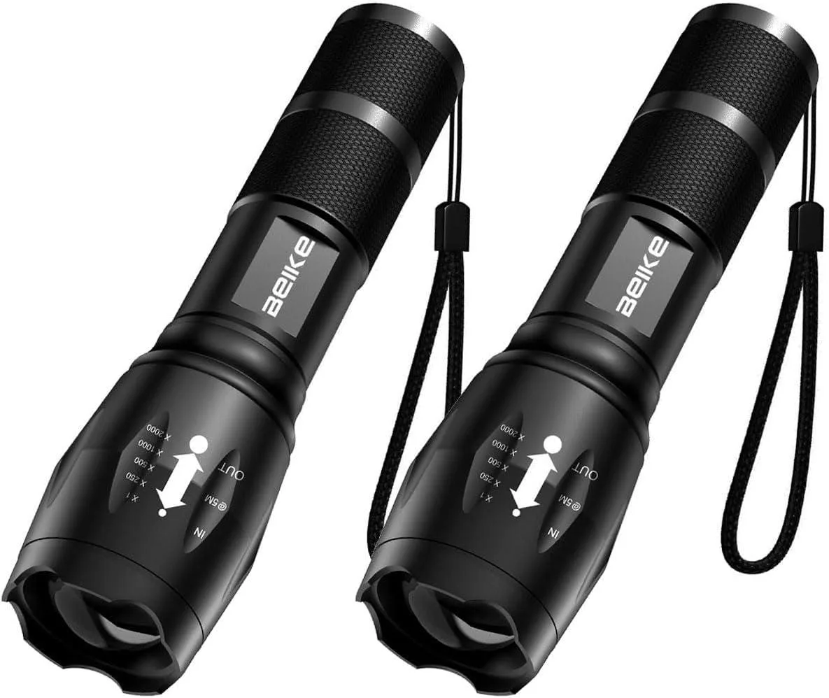 Two compact black flashlights side by side, each 5.1 inches long with textured grip and zoomable head