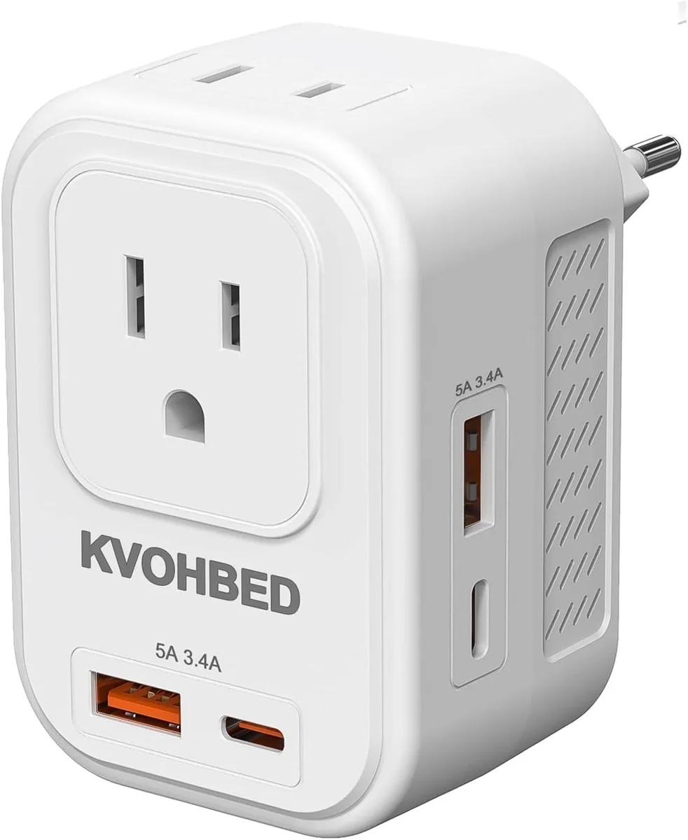 White compact voltage converter with two US outlets, two USB-C and two USB-A ports