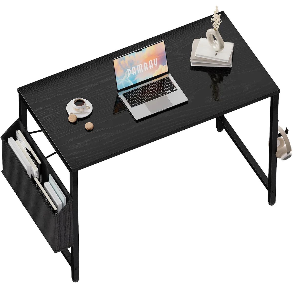 Black rectangular desk with leather finish, metal X-brace legs, side storage bag and headphone hook
