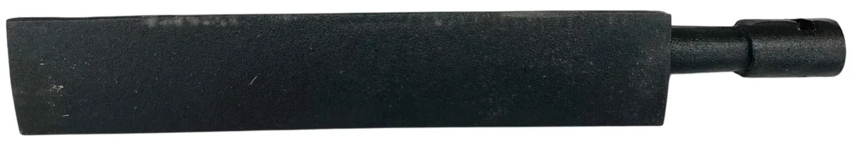 Rectangular cast iron grill burner with textured dark finish, approximately sixteen by two inches