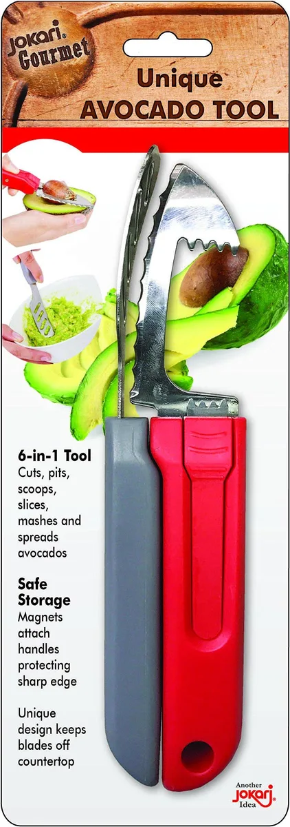 Red plastic avocado tool with two hinged halves, serrated blade and scoop visible