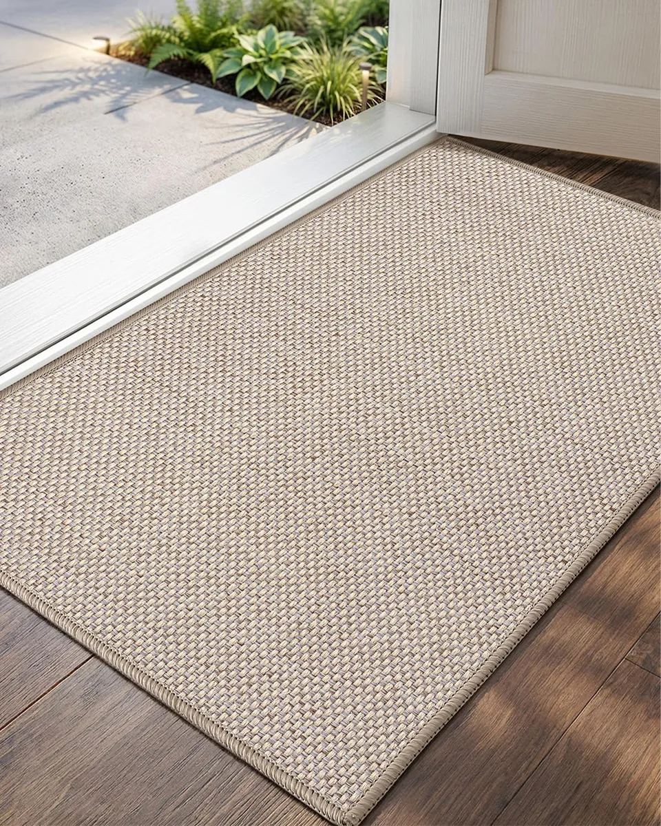 Khaki bamboo door mat, low-profile striped design, rolled without creases