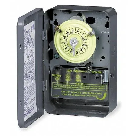Gray metal enclosure electromechanical timer with dial and trippers