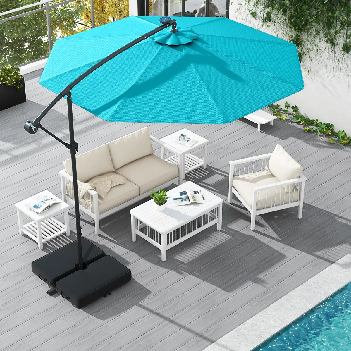 Turquoise 10 ft offset cantilever umbrella with 40 solar lights, crank tilt, sandbag base