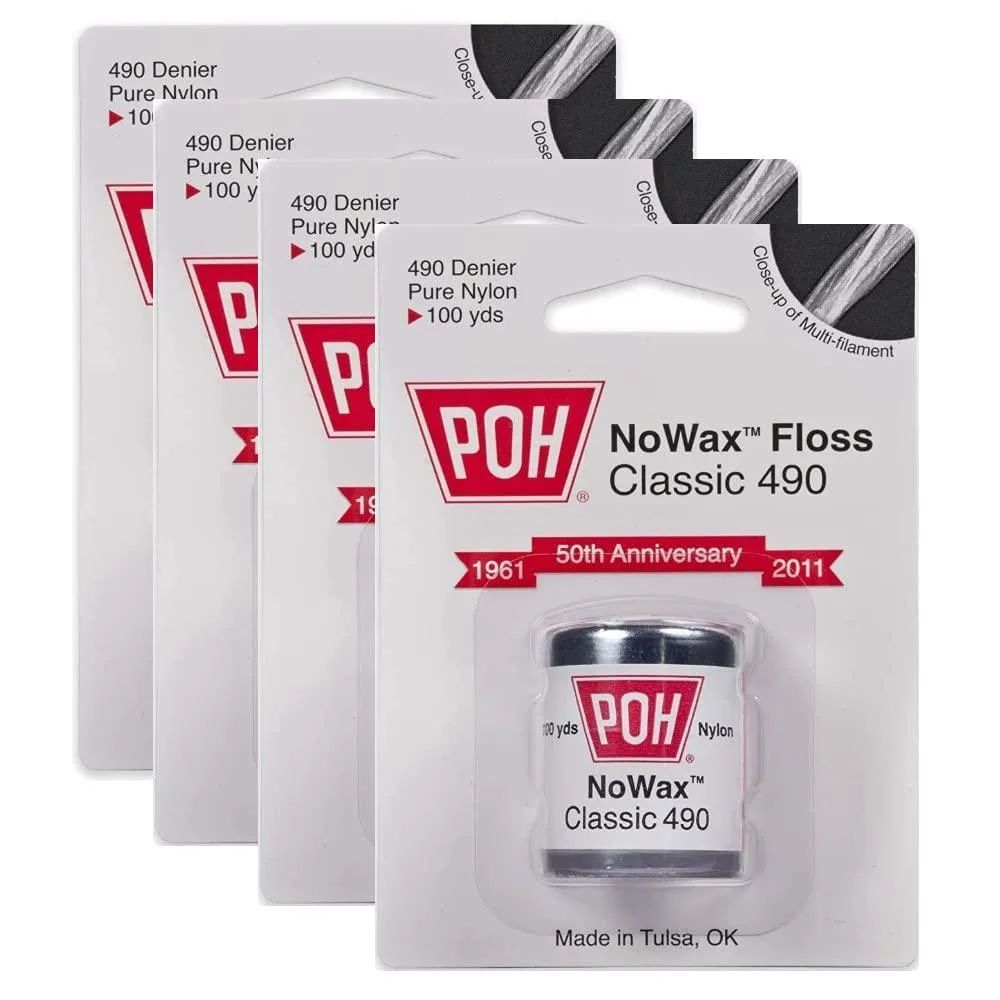 Four white floss boxes in a cardboard holder