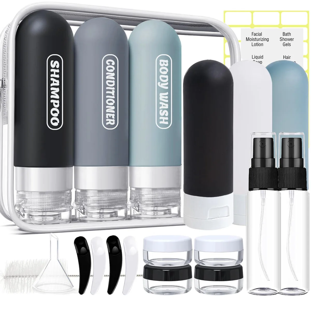 20-piece travel toiletry set in dark colours with bottles jars and transparent bag