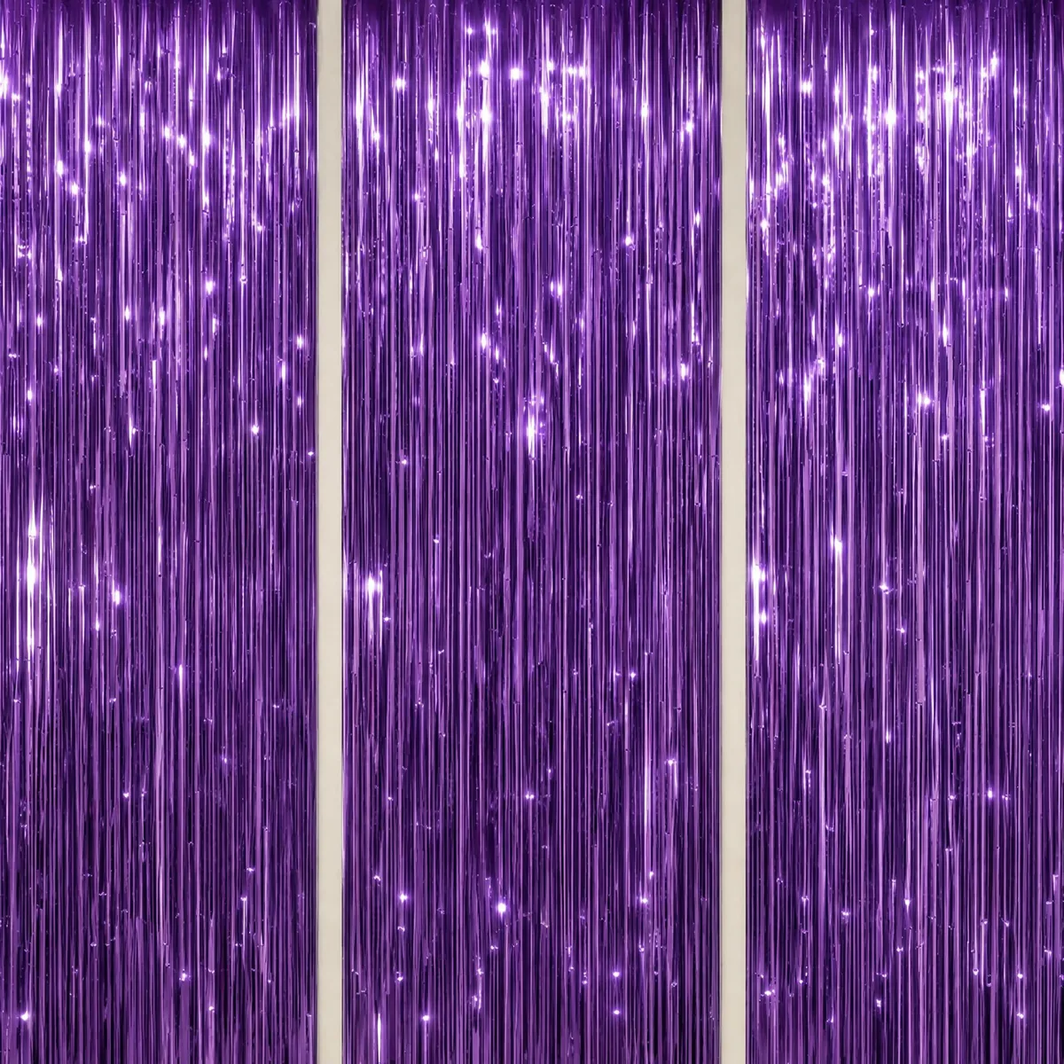 Three purple shiny tinsel curtains 3.3 by 8.2 ft each