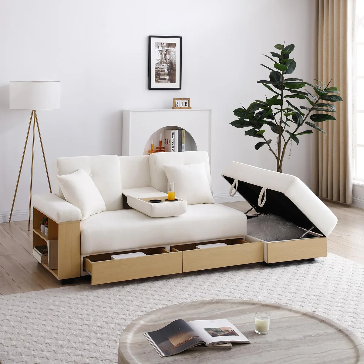 Beige convertible sleeper sofa with ottoman, drop-down table and cup holders
