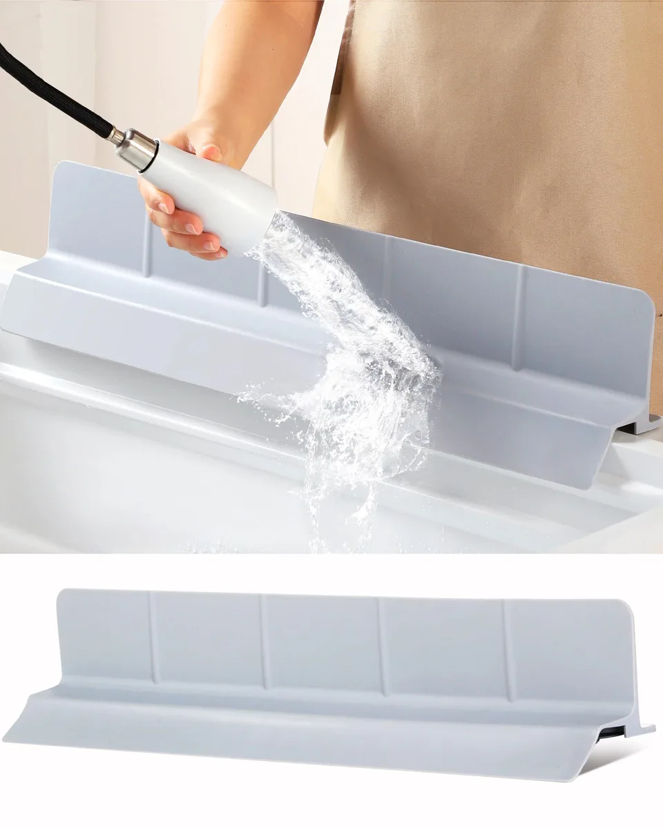 Grey silicone splash guard 23 inches long with high wall and suction cups