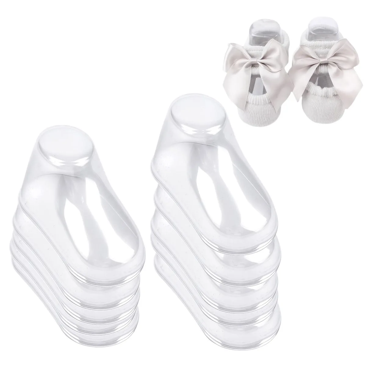Ten pairs of clear PVC shoe shapers, each 9 cm long