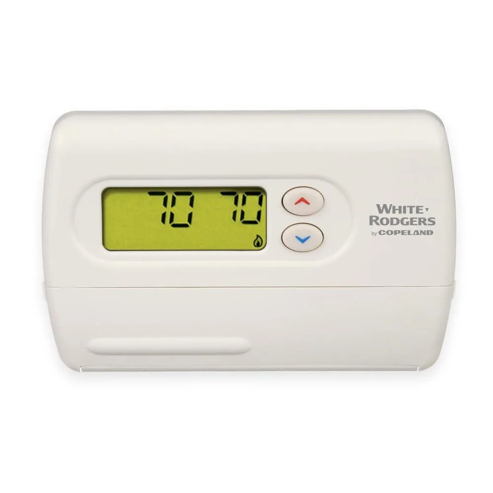 White rectangular thermostat with backlit digital display and manual controls