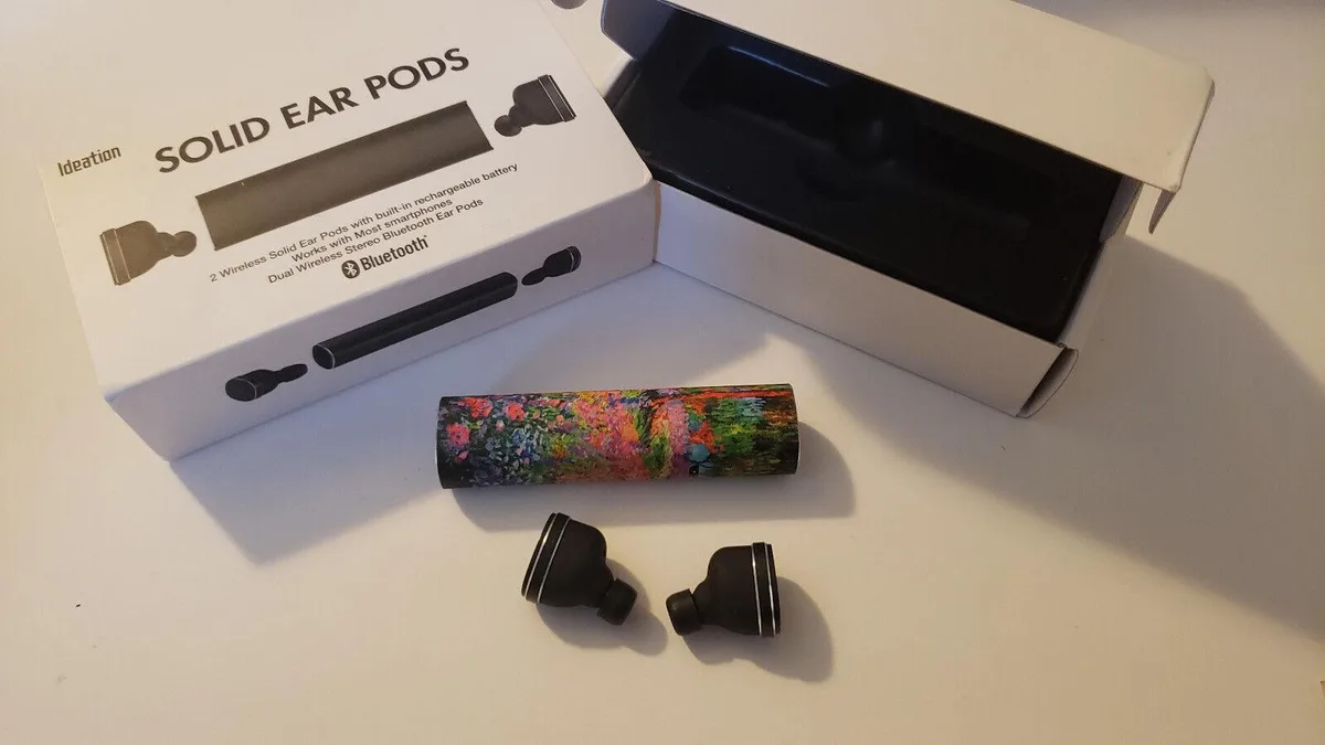 Pink floral wireless earbuds with matching charging case