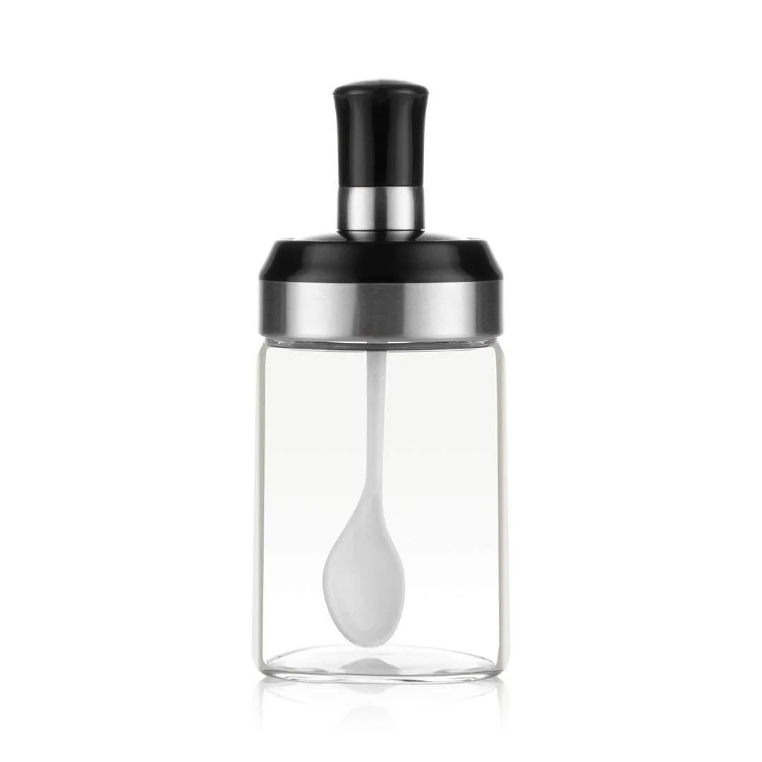 Clear glass jar with stainless steel lid and attached spoon, red decorative sticker, 9.7oz capacity