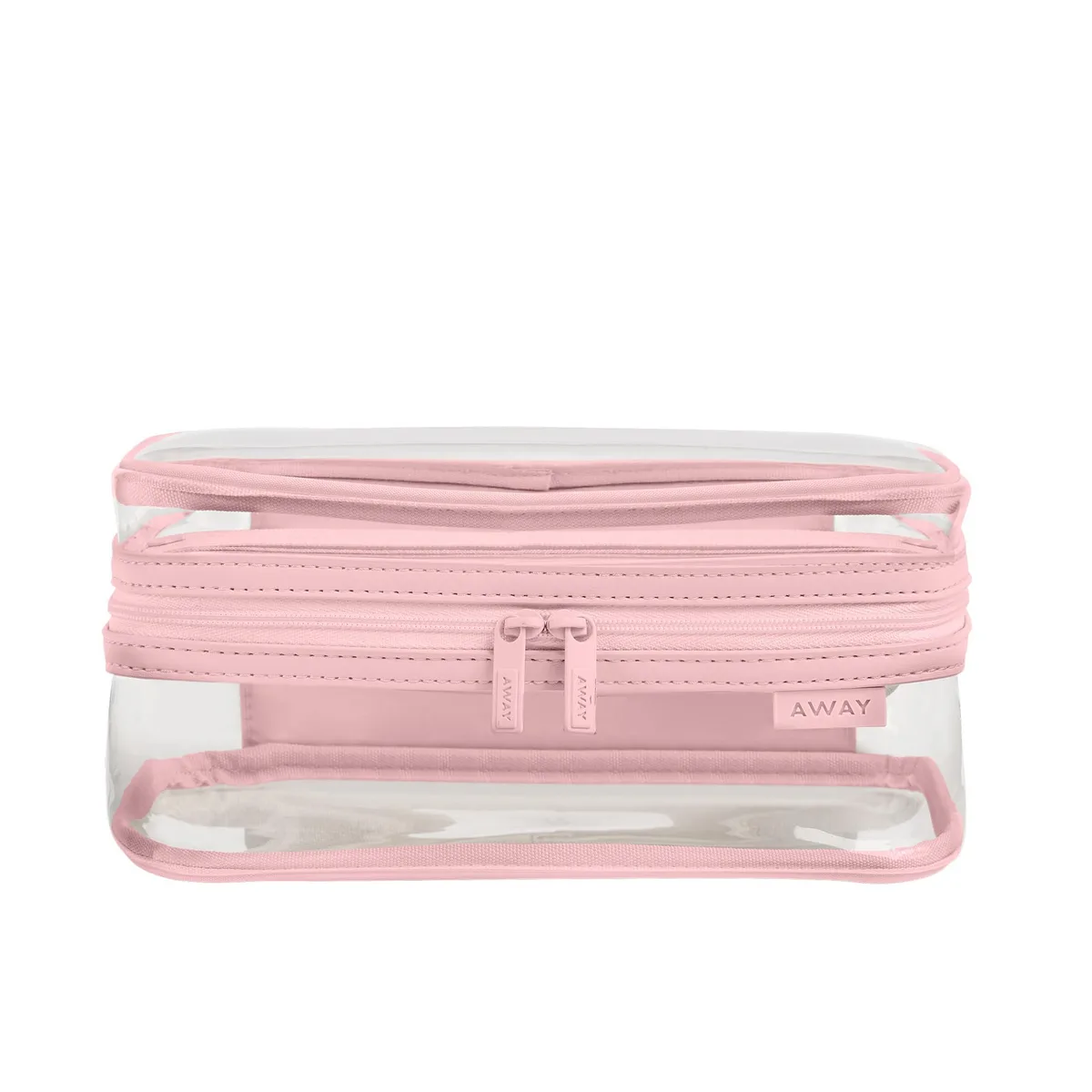 Small rectangular clear toiletry bag in blush pink with top handle and zip closure