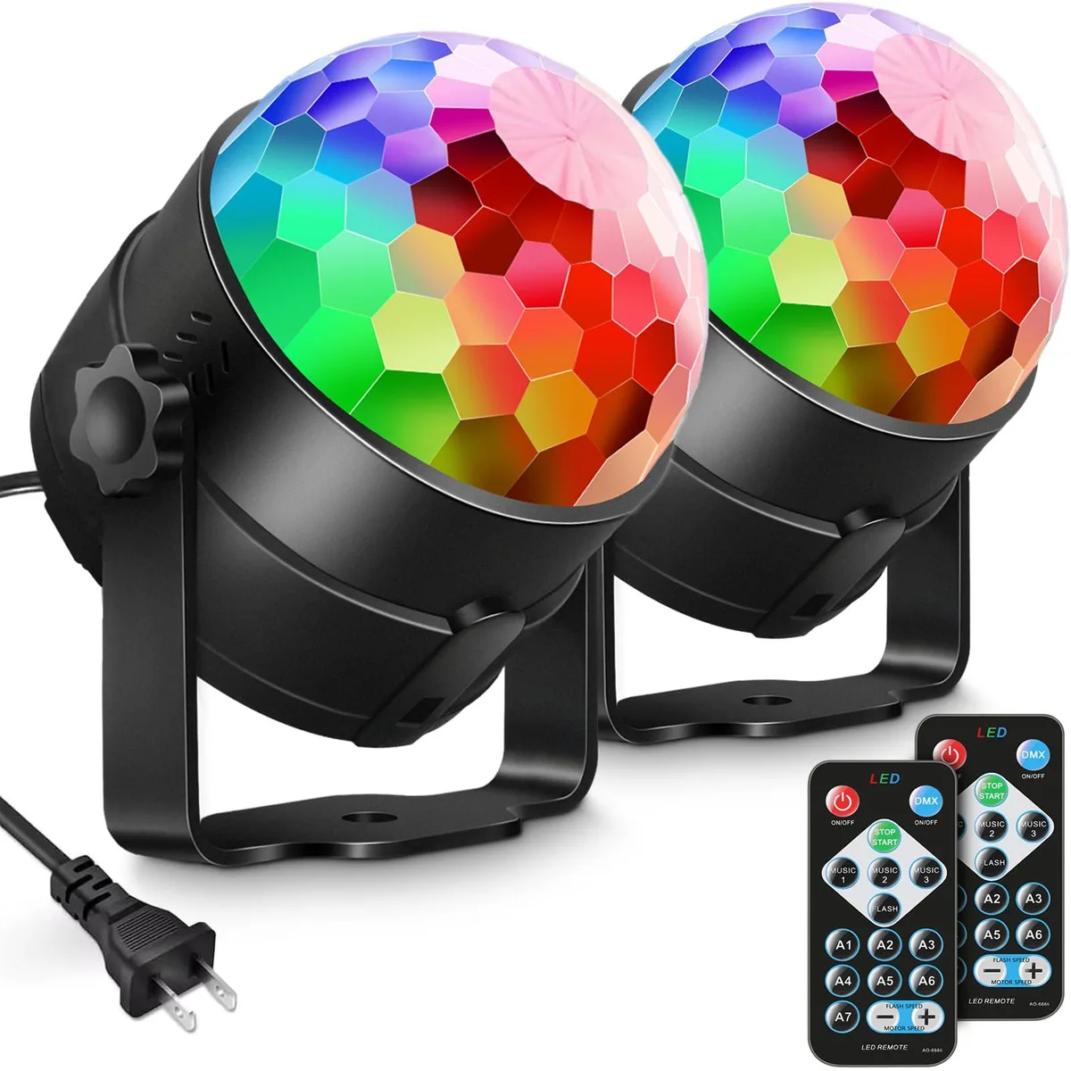 Two black plastic cube spotlights with remote control, RGB LEDs and sound activation
