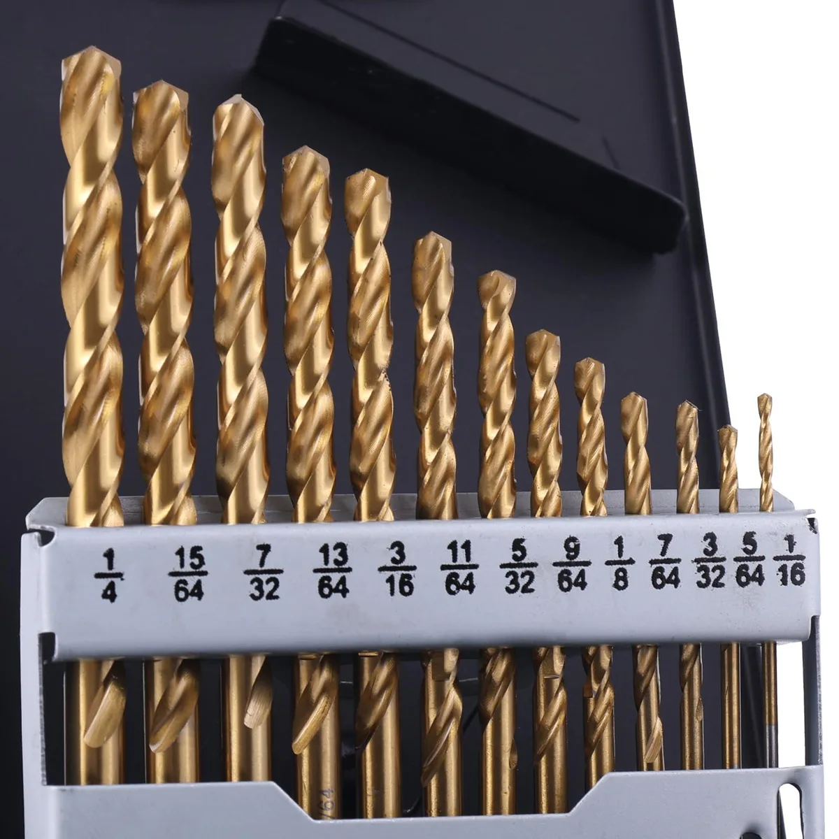 Thirteen gold cobalt drill bits in a metal index storage case