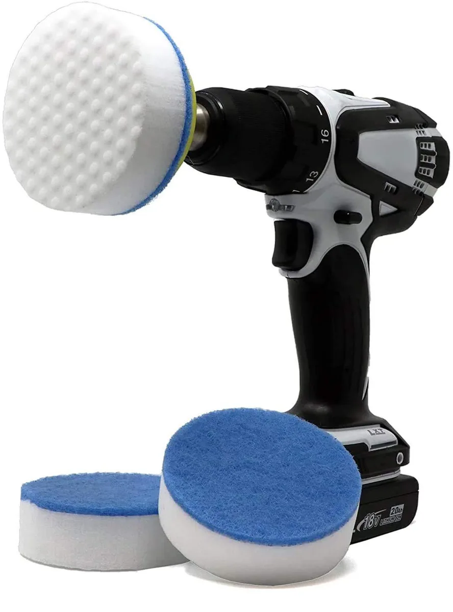 White melamine sponge pads with black drill shaft and connector plate on cardboard backing