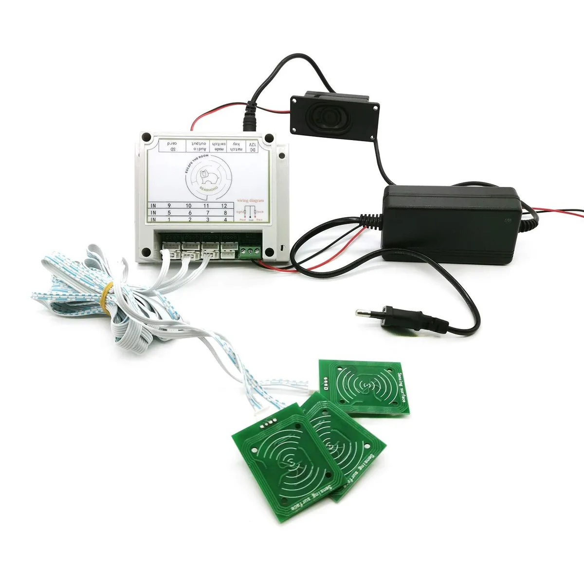 Black rectangular controller box with three white RFID sensor modules and matching IC cards, wired connections visible