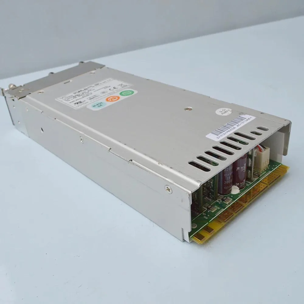 Silver rectangular server power supply module with rear fan grille and power socket