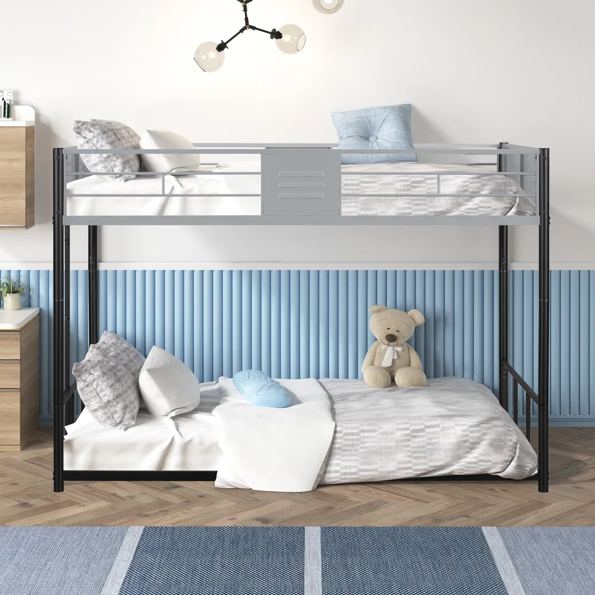 Black metal twin-over-twin bunk bed with vent-board guardrails and wooden slats