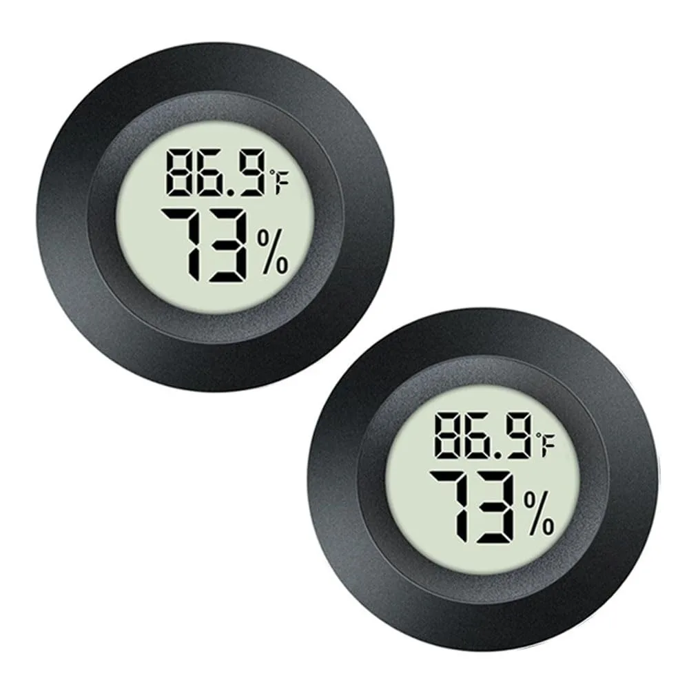 Two small round yellow digital thermo-hygrometers with LCD screens