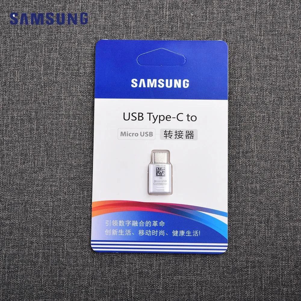 Small white USB-C to Micro USB adapter with compact reversible connector