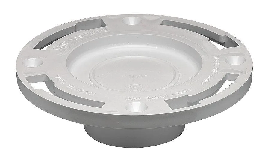 White PVC floor toilet flange with test cap attached