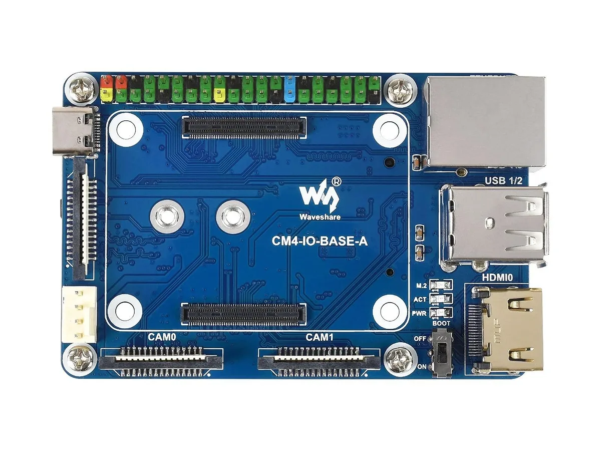 Green rectangular circuit board with white GPIO header and multiple ports