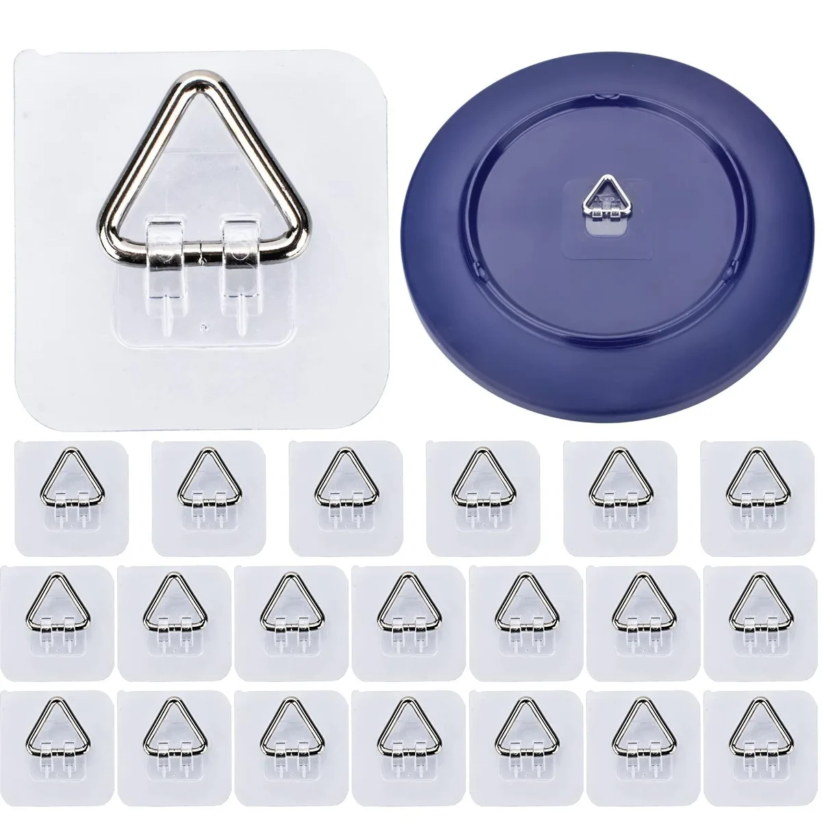 Twenty small square adhesive plate hangers with metal hooks on a white background