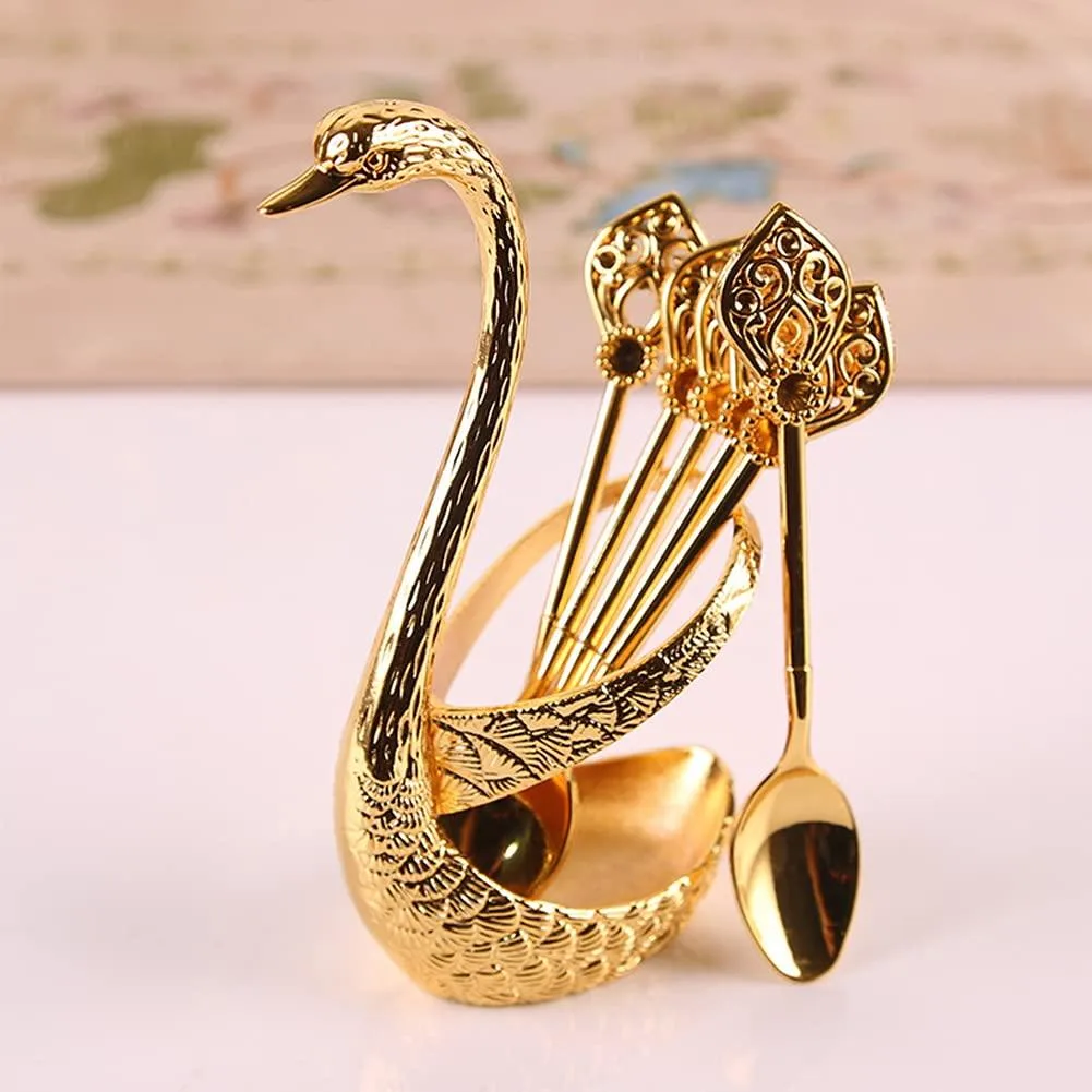 Gold swan-shaped holder with matching spoons, metallic finish