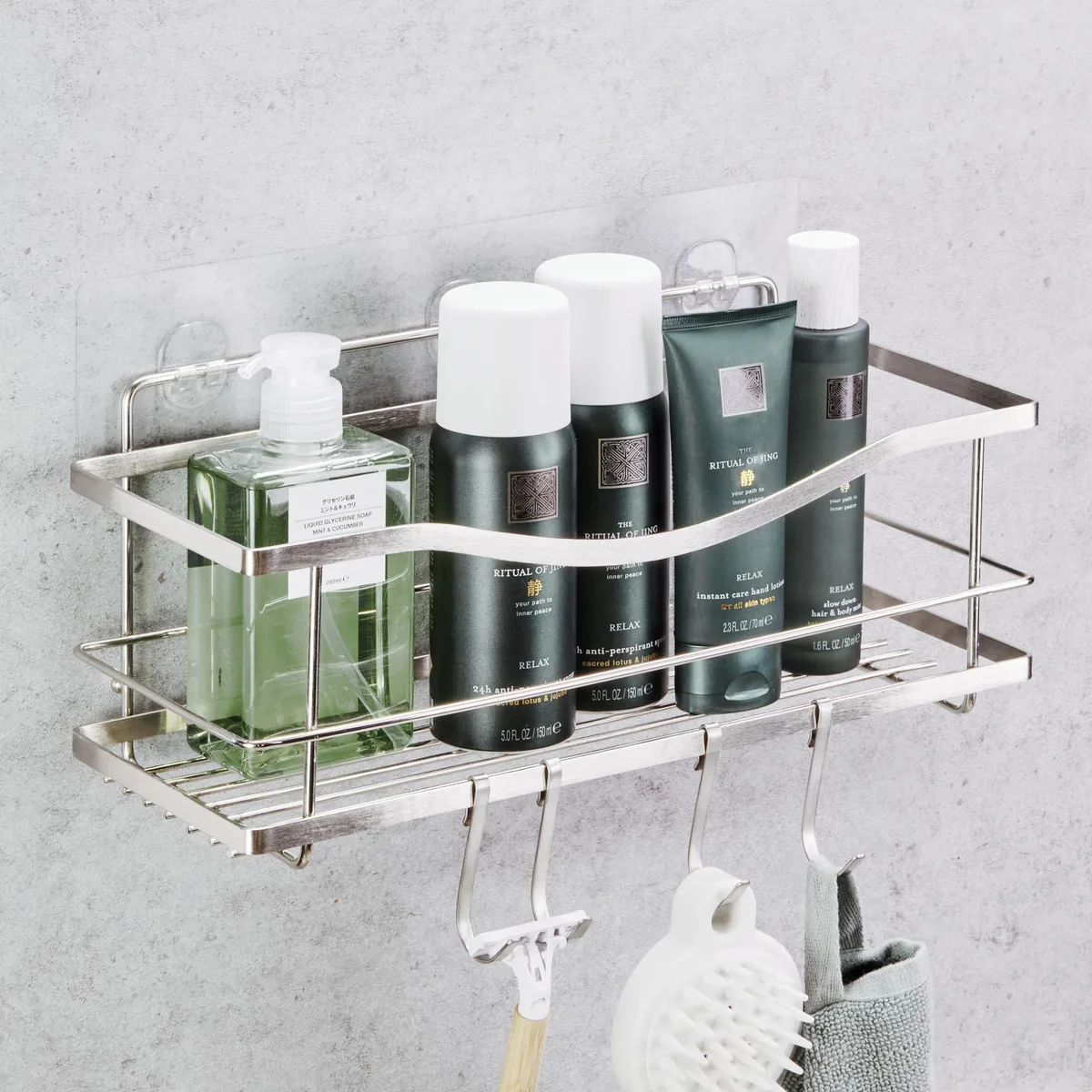 Silver 304 stainless steel shower caddy with four hooks, adhesive mount