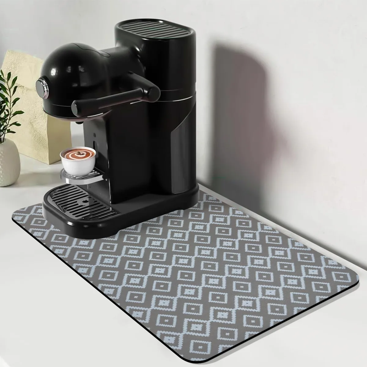 Grey-white plaid rectangular mat 12 by 19 inches with textured surface and rubber backing