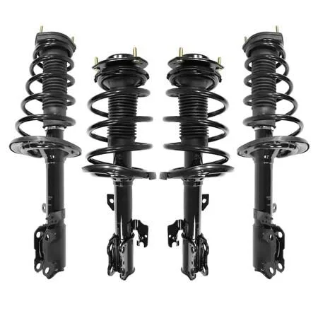 Four complete strut assemblies in cardboard boxes