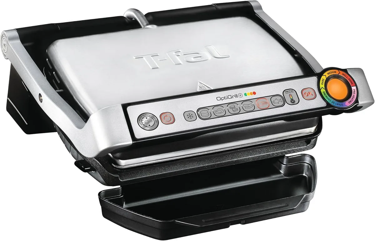 Silver electric grill with removable nonstick plates and drip tray