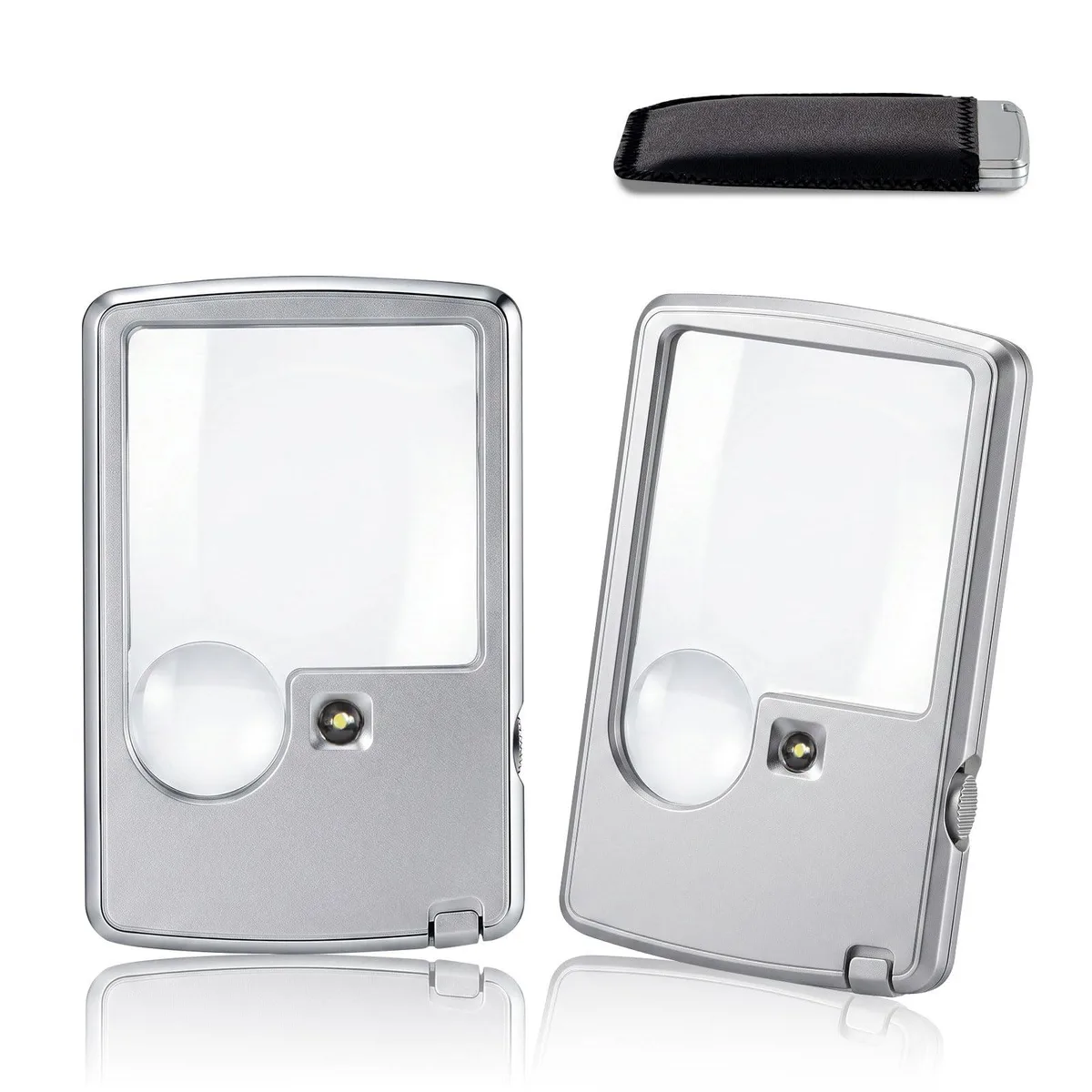 Two silver pocket magnifiers with LED lights and protective sleeves