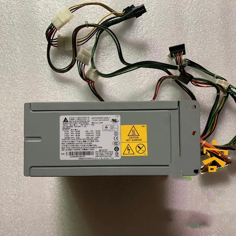 Rectangular silver server power supply unit with rear exhaust grille and power connector