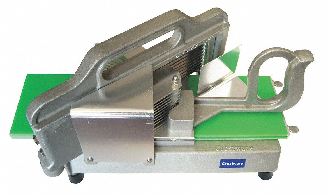 Green stainless steel tomato slicer with handle and blade grid
