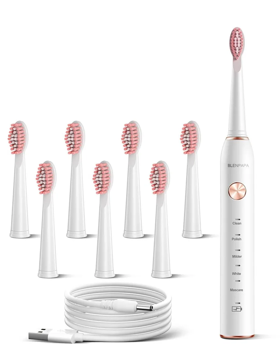 White cylindrical sonic toothbrush with brush head attached