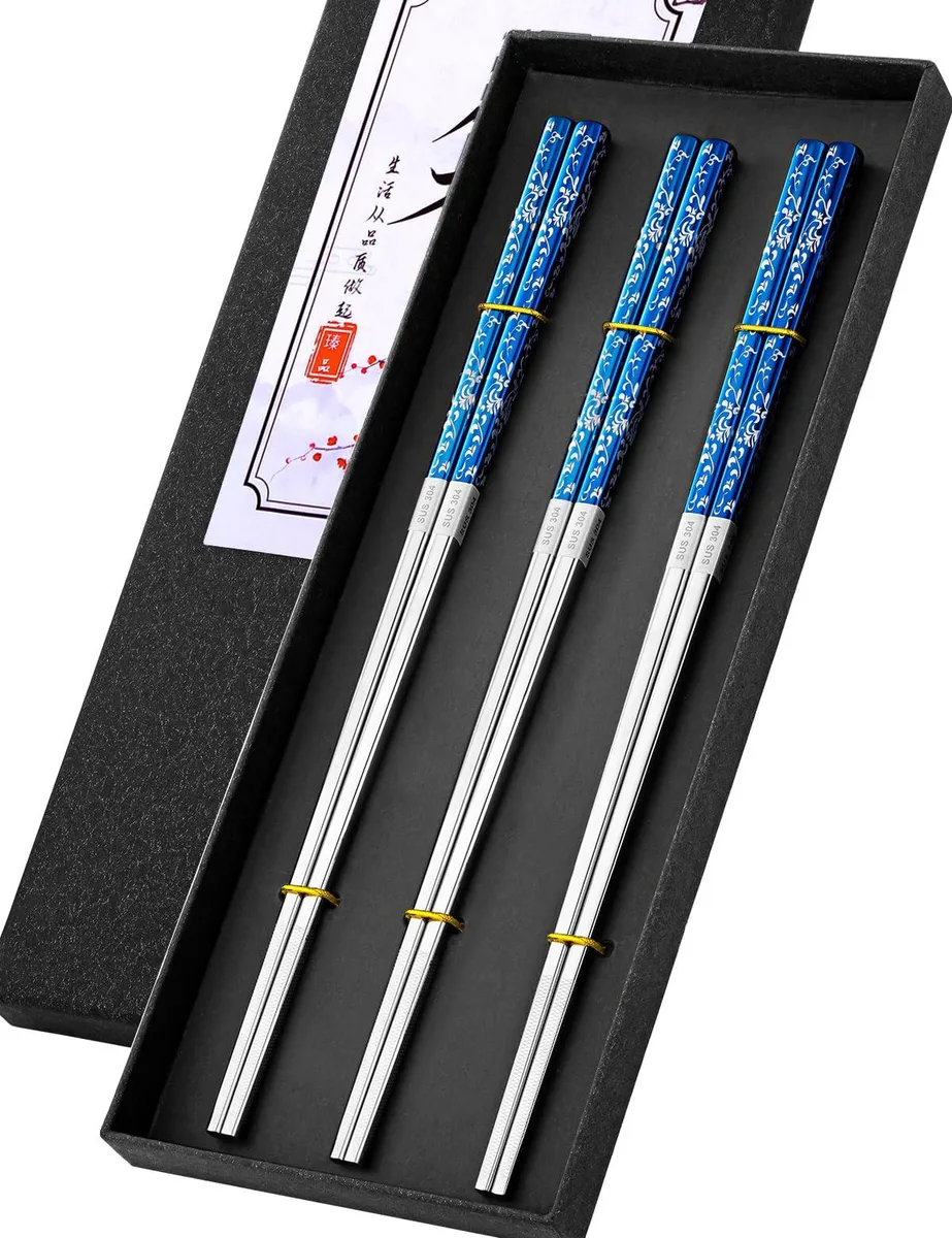OXO 24-piece stainless steel cutlery set in black finish, includes chopsticks and spoons