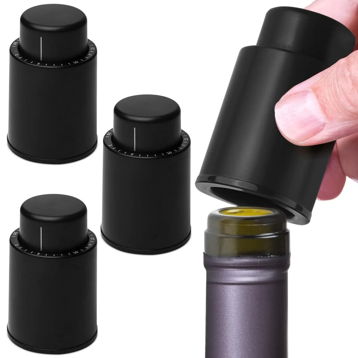 Four black vacuum wine stoppers with date indicators, pack of four