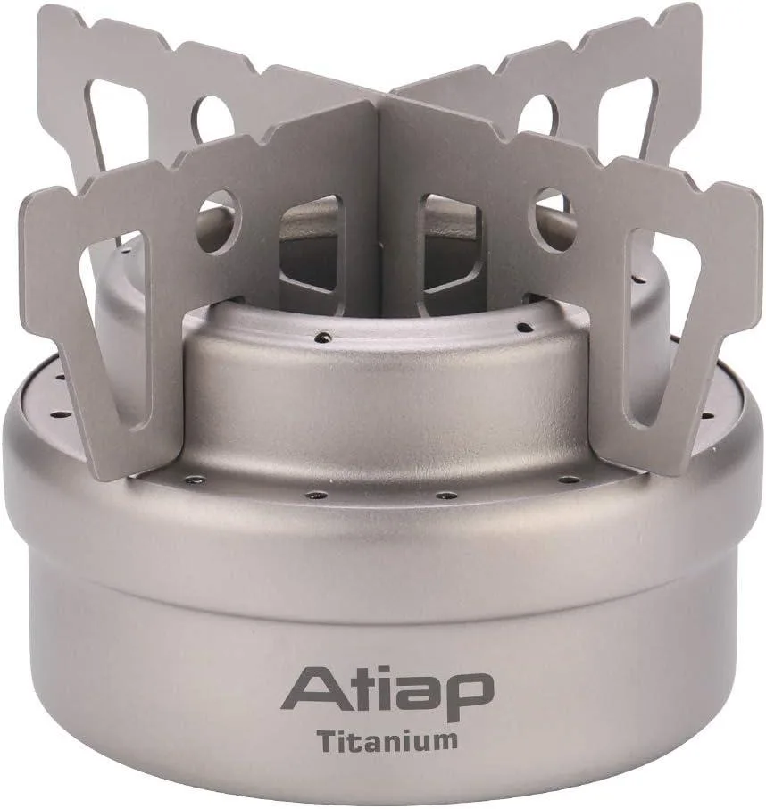 Titanium alcohol stove with measurement marks, cross stand, and drawstring sack