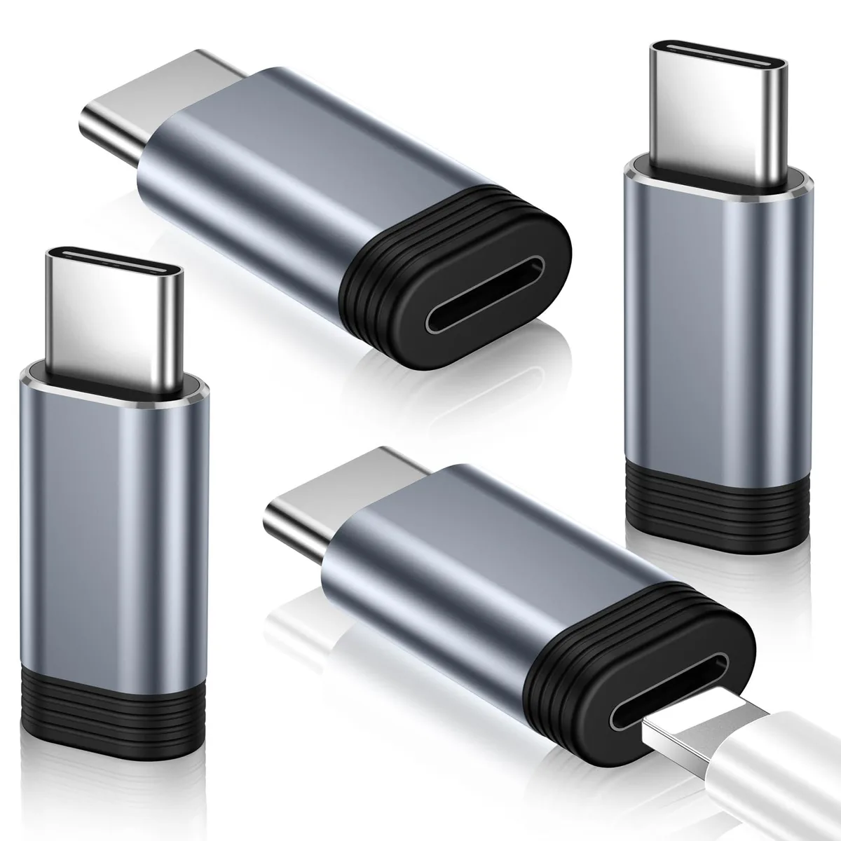 Four gray Lightning to USB-C adapters with silicone sleeves