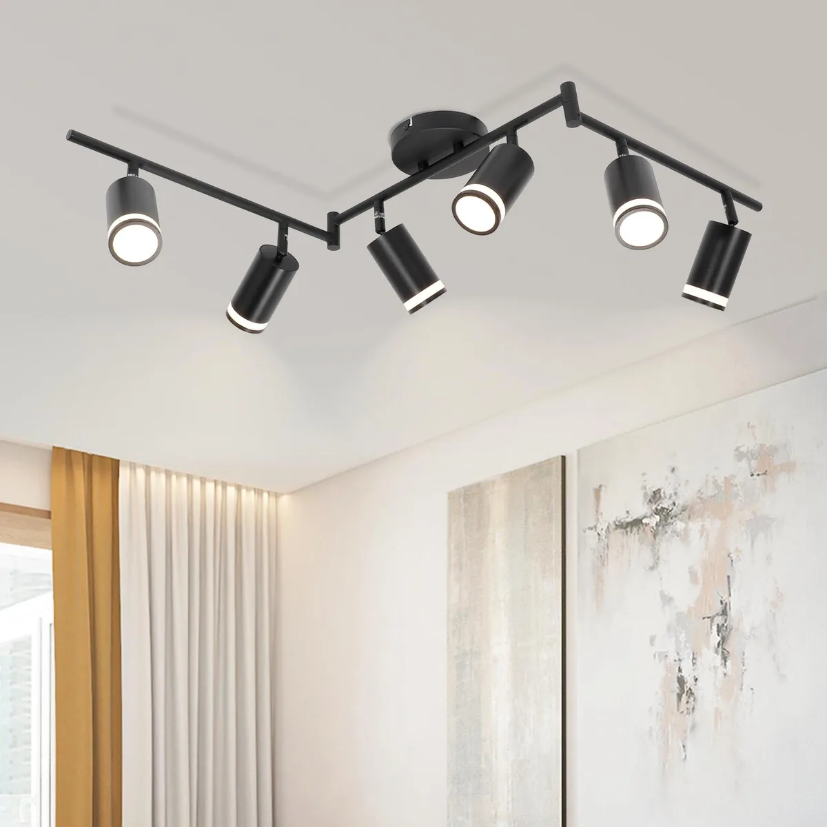 Black six-head track light kit with acrylic-ringed spot heads on a 46-inch bar