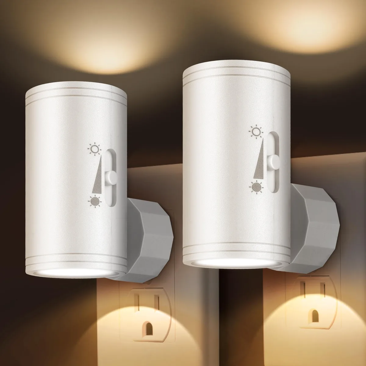 Two small round plug-in night lights with adjustable white plastic heads