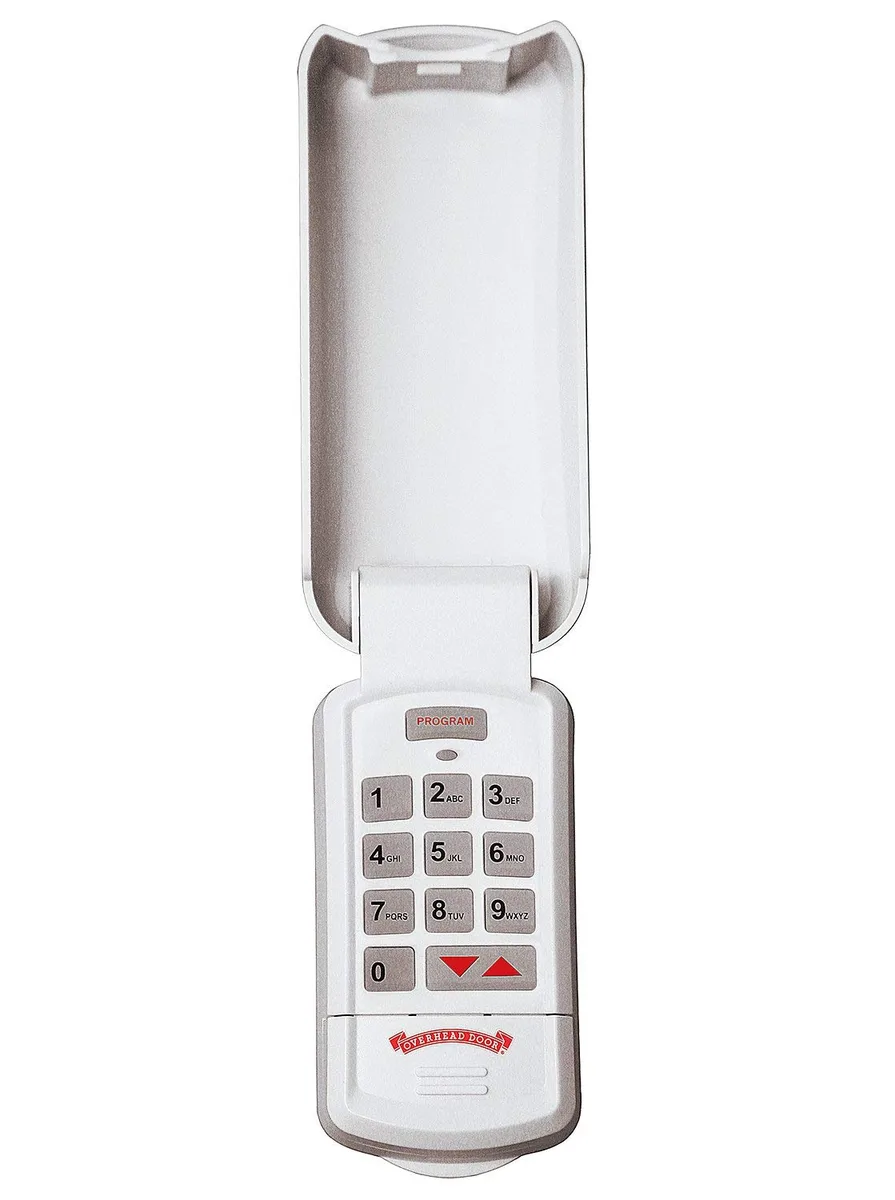 White rectangular wireless garage door keypad with flip-up cover and lighted buttons